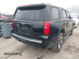 2016 Chevrolet Tahoe LTZ z VIN 1GNSCCKC2GR100879, wystawiony jako IAAI lot #41112832 z przebiegiem 213 649 mil mil oraz . Historia ofert i sprzedaży dostępna na DreamBid. Obrazek 4.