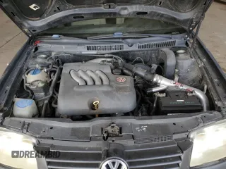 1999 Volkswagen Jetta GL z VIN 3VWRA29M7XM058584, wystawiony jako Copart lot #83714754 z przebiegiem 398 647 mil mil oraz Szkoda całkowita • Salvage title. Historia ofert i sprzedaży dostępna na DreamBid. Obrazek 11.