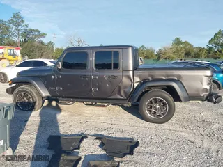 2023 Jeep Gladiator Overland with VIN 1C6HJTFG1PL546604, listed as a IAAI auction lot 41599632 with 23,108 mi miles. Bid and sale history available at carsss.com. Image 15.