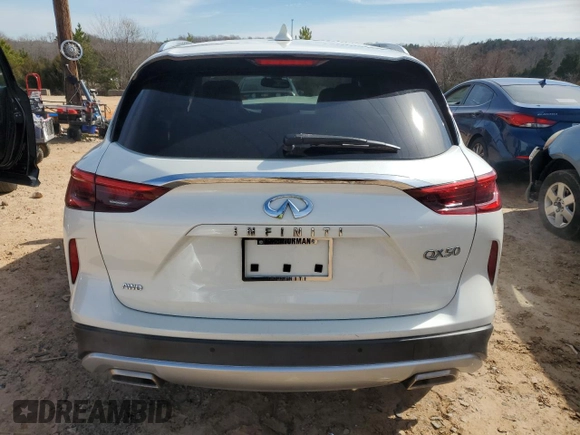 2021 Infiniti QX50 Luxe z VIN 3PCAJ5BB5MF125399, wystawiony jako Copart lot #45708015 z przebiegiem 26 913 mil mil oraz Szkody całkowita. Historia ofert i sprzedaży dostępna na DreamBid. Obrazek 6.