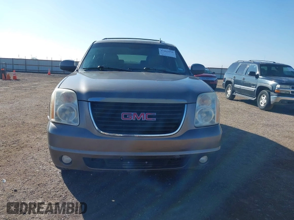 2012 GMC Yukon XL SLT with VIN 1GKS2KE73CR167820, listed as a IAAI auction lot 41462950 with 243,554 mi miles. Bid and sale history available at carsss.com. Image 12.