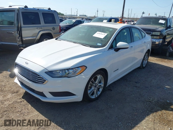 2018 Ford Fusion SE z VIN 3FA6P0LU2JR155483, wystawiony jako IAAI lot #42019475 z przebiegiem Nie podano mil oraz . Historia ofert i sprzedaży dostępna na DreamBid. Obrazek 2.