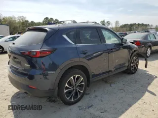 2022 Mazda CX-5 2.5 S Premium Package with VIN JM3KFBDMXN0559814, listed as a Copart auction lot 50985535 with 34,612 mi miles and Salvage Title. Bid and sale history available at carsss.com. Image 3.