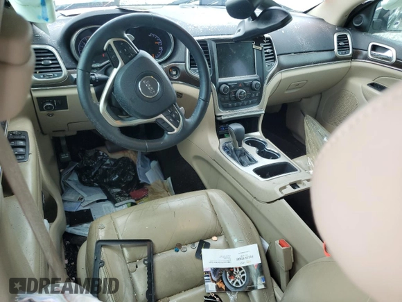 2017 Jeep Grand Cherokee Limited with VIN 1C4RJEBG9HC837822, listed as a Copart auction lot 57498835 with 140,179 mi miles and Salvage title. Bid and sale history available at DreamBid. Image 8.