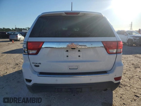 2013 Jeep Grand Cherokee Overland with VIN 1C4RJFCG8DC606862, listed as a Copart auction lot 82149804 with 155,999 mi miles and Salvage Title. Bid and sale history available at carsss.com. Image 6.