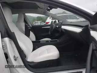 2023 Tesla Model 3 with VIN 5YJ3E1EA2PF626392, listed as a IAAI auction lot 42288413 with 25,605 mi miles and . Bid and sale history available at DreamBid. Image 5.