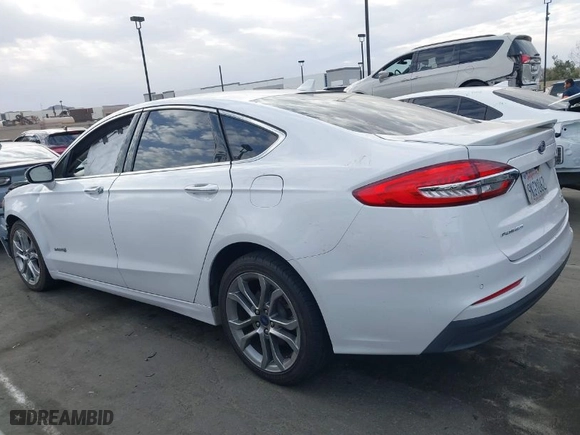 2019 Ford Fusion Hybrid Titanium with VIN 3FA6P0RU2KR104817, listed as a IAAI auction lot 41695813 with NaN miles. Bid and sale history available at carsss.com. Image 14.