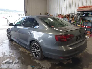 2016 Volkswagen Jetta Sport z VIN 3VWD17AJ8GM410208, wystawiony jako IAAI lot #42237019 z przebiegiem 67 137 mil mil oraz . Historia ofert i sprzedaży dostępna na DreamBid. Obrazek 3.