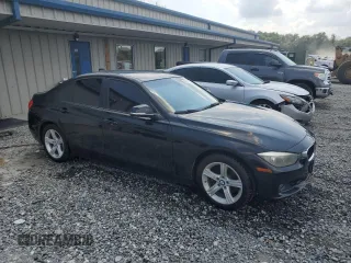 2013 BMW 3 Series 328i with VIN WBA3A5C57DF602652, listed as a Copart auction lot 60874345 with 147,214 mi miles and Salvage title. Bid and sale history available at DreamBid. Image 4.