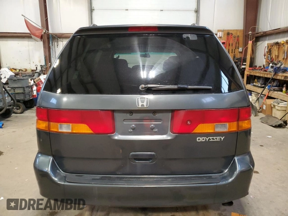 2003 Honda Odyssey EX with VIN 2HKRL18603H008412, listed as a Copart auction lot 87502365 with 352,773 mi miles and Salvage Title. Bid and sale history available at DreamBid. Image 6.