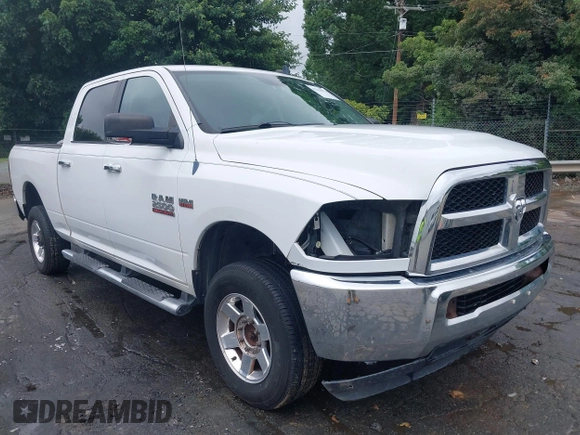 2013 Ram 2500 SLT z VIN 3C6TR5DT7DG524758, wystawiony jako IAAI lot #42333873 z przebiegiem Nie podano mil oraz . Historia ofert i sprzedaży dostępna na DreamBid. Obrazek 1.