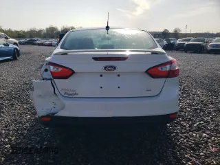 2012 Ford Focus SE with VIN 1FAHP3F27CL182474, listed as a Copart auction lot 51451595 with 122,199 mi miles and Salvage Title. Bid and sale history available at DreamBid. Image 6.