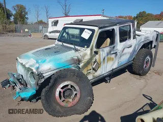 2020 Jeep Gladiator Sport S with VIN 1C6HJTAG3LL109494, listed as a IAAI auction lot 40677949 with 52,079 mi miles and . Bid and sale history available at DreamBid. Image 17.
