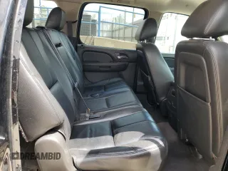2014 Chevrolet Suburban LT with VIN 1GNSKJE77ER193143, listed as a Copart auction lot 54311935 with 171,407 mi miles and Salvage Title. Bid and sale history available at DreamBid. Image 11.