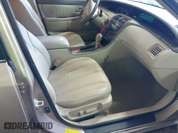 2002 Toyota Avalon XL with VIN 4T1BF28B12U260987, listed as a IAAI auction lot 42113276 with 181,537 mi miles and . Bid and sale history available at DreamBid. Image 5.