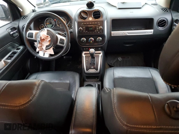 2016 Jeep Compass Latitude with VIN 1C4NJCEB7GD664653, listed as a Copart auction lot 87313664 with 64,580 mi miles and Salvage Title. Bid and sale history available at carsss.com. Image 8.