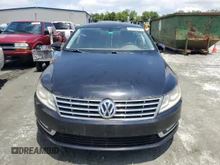 2013 Volkswagen CC Sport z VIN WVWBP7AN4DE551824, wystawiony jako Copart lot #58499425 z przebiegiem 121 809 mil mil oraz Tytuł czysty. Historia ofert i sprzedaży dostępna na DreamBid. Obrazek 5.