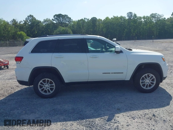 2020 Jeep Grand Cherokee Laredo E with VIN 1C4RJFAG1LC389026, listed as a IAAI auction lot 42261396 with 100,409 mi miles and . Bid and sale history available at DreamBid. Image 13.