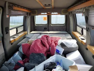 2001 Ford Econoline Cargo with VIN 1FDRE14W41HB55470, listed as a Copart auction lot 64990214 with 176,643 mi miles and Clean Title. Bid and sale history available at DreamBid. Image 10.