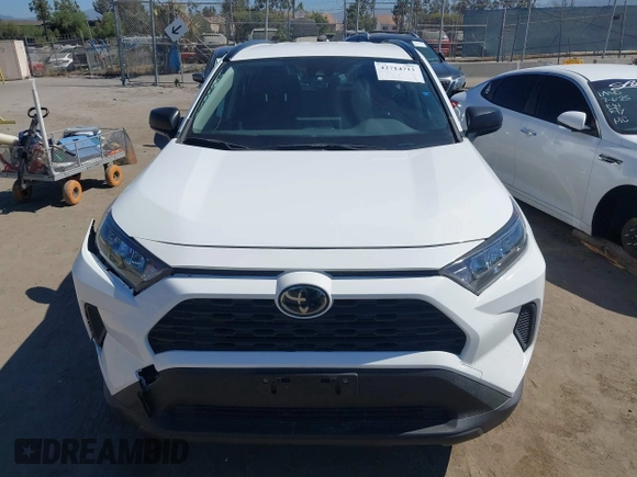 2019 Toyota RAV4 LE with VIN JTMH1RFV4KJ015962, listed as a IAAI auction lot 42714711 with 26,089 mi miles and . Bid and sale history available at DreamBid. Image 12.