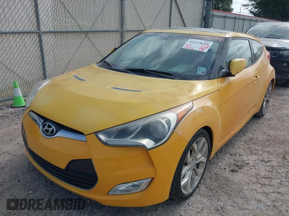 2012 Hyundai Veloster w/Gray Int z VIN KMHTC6AD7CU026855, wystawiony jako IAAI lot #42253694 z przebiegiem 119 802 mil mil oraz . Historia ofert i sprzedaży dostępna na DreamBid. Obrazek 6.
