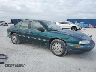 1997 Chevrolet Lumina LS with VIN 2G1WL52M1V9120300, listed as a Copart auction lot 87460394 with 142,588 mi miles and Salvage Title. Bid and sale history available at DreamBid. Image 4.