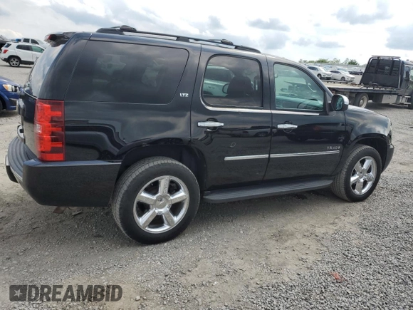 2014 Chevrolet Tahoe LTZ with VIN 1GNSKCE0XER228028, listed as a Copart auction lot 56971135 with 155,285 mi miles and Salvage title. Bid and sale history available at DreamBid. Image 3.