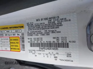 2016 Ford Fusion SE Hybrid with VIN 3FA6P0LU4GR144591, listed as a IAAI auction lot 42592828 with 96,184 mi miles and . Bid and sale history available at DreamBid. Image 9.