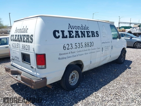2000 Ford Econoline Cargo with VIN 1FTRE1428YHB75166, listed as a IAAI auction lot 42169852 with 297,756 mi miles. Bid and sale history available at carsss.com. Image 4.