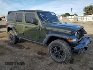 2021 Jeep Wrangler Unlimited Willys with VIN 1C4HJXDM0MW655574, listed as a Copart auction lot 82288524 with 34,986 mi miles and Salvage title. Bid and sale history available at DreamBid. Image 4.