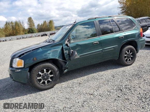 2005 GMC Envoy SLT with VIN 1GKDT13S952144349, listed as a Copart auction lot 71800694 with 137,614 mi miles and Salvage Title. Bid and sale history available at DreamBid. Image 1.