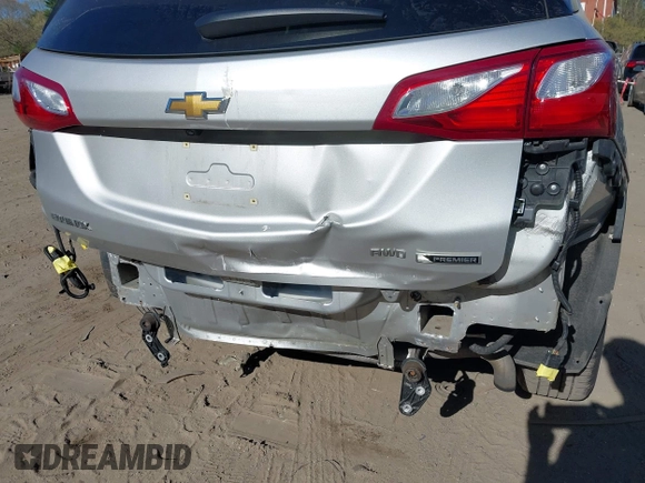 2018 Chevrolet Equinox Premier with VIN 3GNAXVEV4JS598239, listed as a IAAI auction lot 42112886 with 142,093 mi miles and . Bid and sale history available at DreamBid. Image 6.
