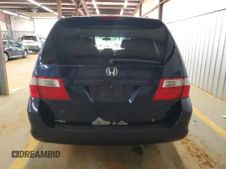 2005 Honda Odyssey EX-L with VIN 5FNRL38785B054186, listed as a Copart auction lot 58072125 with 219,928 mi miles and Salvage title. Bid and sale history available at DreamBid. Image 6.