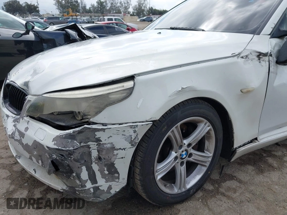 2010 BMW 5 Series 528i with VIN WBANU5C53AC460104, listed as a IAAI auction lot 42136658 with 107,031 mi miles and . Bid and sale history available at carsss.com. Image 6.