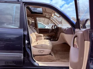 2002 Toyota Land Cruiser z VIN JTEHT05J622022972, wystawiony jako Copart lot #59201475 z przebiegiem 299 548 mil mil oraz Czysty tytuł • Clean title. Historia ofert i sprzedaży dostępna na DreamBid. Obrazek 5.