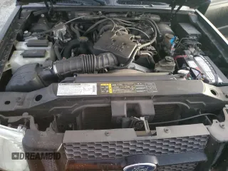2002 Ford Explorer Sport Value z VIN 1FMYU60E92UC86847, wystawiony jako Copart lot #77086944 z przebiegiem 147 827 mil mil oraz Szkoda całkowita • Salvage title. Historia ofert i sprzedaży dostępna na DreamBid. Obrazek 12.
