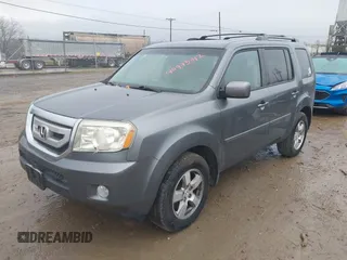 2011 Honda Pilot EX-L with VIN 5FNYF4H60BB034218, listed as a IAAI auction lot 40775312 with 168,549 mi miles and . Bid and sale history available at carsss.com. Image 17.