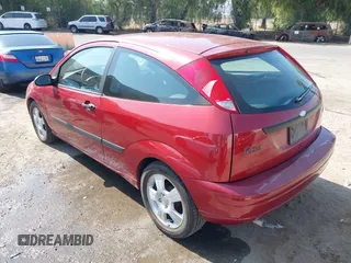 2003 Ford Focus ZX3 with VIN 3FAHP31323R119865, listed as a IAAI auction lot 42738163 with 64,008 mi miles and . Bid and sale history available at DreamBid. Image 3.