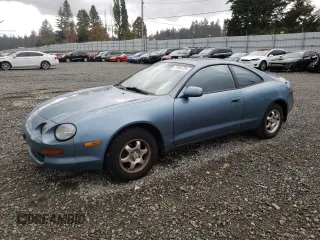 1995 Toyota Celica ST with VIN JT2AT00N7S0047304, listed as a Copart auction lot 77003784 with 423,438 mi miles and Salvage Title. Bid and sale history available at carsss.com. Image 1.
