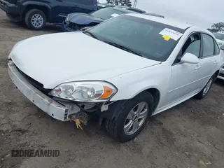 2014 Chevrolet Impala LS with VIN 2G1WA5E31E1163087, listed as a IAAI auction lot 41895666 with 138,348 mi miles and . Bid and sale history available at DreamBid. Image 18.