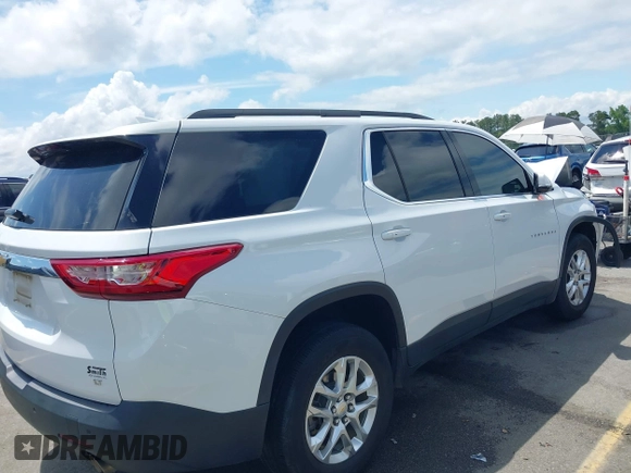 2019 Chevrolet Traverse LT Cloth with VIN 1GNERGKW6KJ128060, listed as a IAAI auction lot 42439758 with 84,406 mi miles and . Bid and sale history available at DreamBid. Image 4.