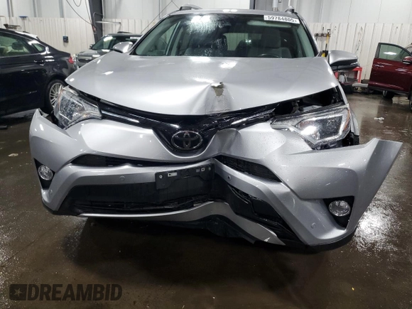 2016 Toyota RAV4 XLE with VIN 2T3RFREV9GW463274, listed as a Copart auction lot 59784805 with 99,138 mi miles and Salvage title. Bid and sale history available at DreamBid. Image 5.