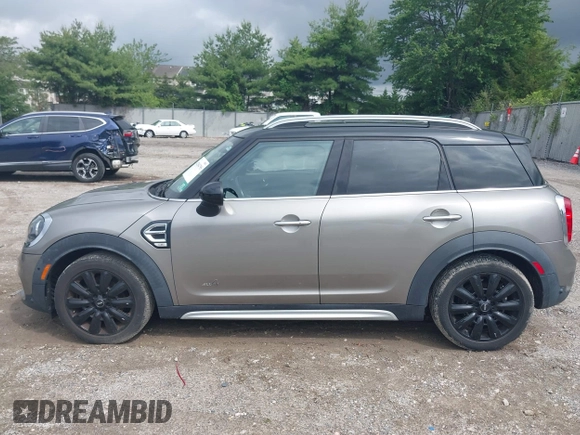 2018 MINI Countryman Cooper z VIN WMZYV5C39J3E02982, wystawiony jako IAAI lot #42384795 z przebiegiem 74 599 mil mil oraz . Historia ofert i sprzedaży dostępna na DreamBid. Obrazek 14.