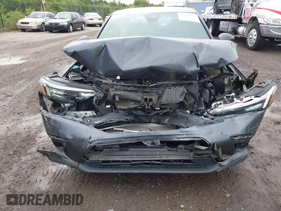2023 Honda Civic Sport with VIN 2HGFE2F5XPH515699, listed as a IAAI auction lot 42441217 with 44,595 mi miles and . Bid and sale history available at DreamBid. Image 6.