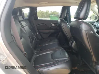2016 Jeep Cherokee Trailhawk z VIN 1C4PJMBSXGW121272, wystawiony jako Copart lot #61769505 z przebiegiem 119 353 mil mil oraz Szkoda całkowita • Salvage title. Historia ofert i sprzedaży dostępna na DreamBid. Obrazek 11.