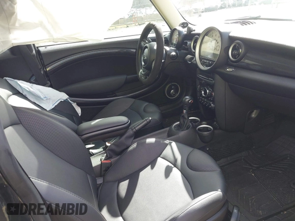 2013 MINI Hardtop S with VIN WMWSV3C50DT394345, listed as a IAAI auction lot 41738216 with 58,241 mi miles and . Bid and sale history available at DreamBid. Image 5.