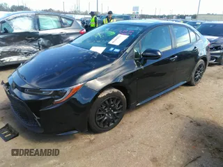 2021 Toyota Corolla LE with VIN JTDEPMAE5MJ126390, listed as a IAAI auction lot 41669331 with 77,398 mi miles. Bid and sale history available at carsss.com. Image 17.