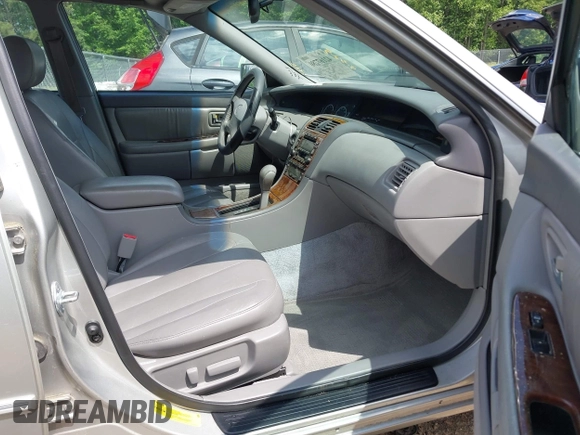 2000 Toyota Avalon XL with VIN 4T1BF28B8YU103644, listed as a IAAI auction lot 42167780 with 209,787 mi miles and . Bid and sale history available at DreamBid. Image 5.