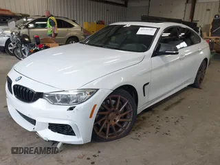 2015 BMW 4 Series 435i xDrive z VIN WBA4B3C53FD669771, wystawiony jako IAAI lot #41835401 z przebiegiem 145 570 mil mil oraz . Historia ofert i sprzedaży dostępna na DreamBid. Obrazek 17.