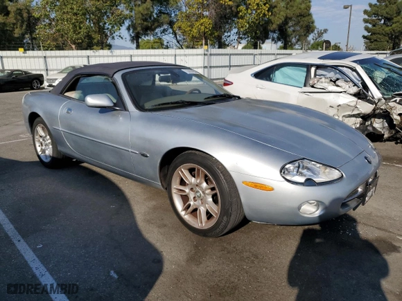 2002 Jaguar XK8 with VIN SAJDA42C22NA30222, listed as a Copart auction lot 73994494 with NaN miles and Salvage Title. Bid and sale history available at carsss.com. Image 4.